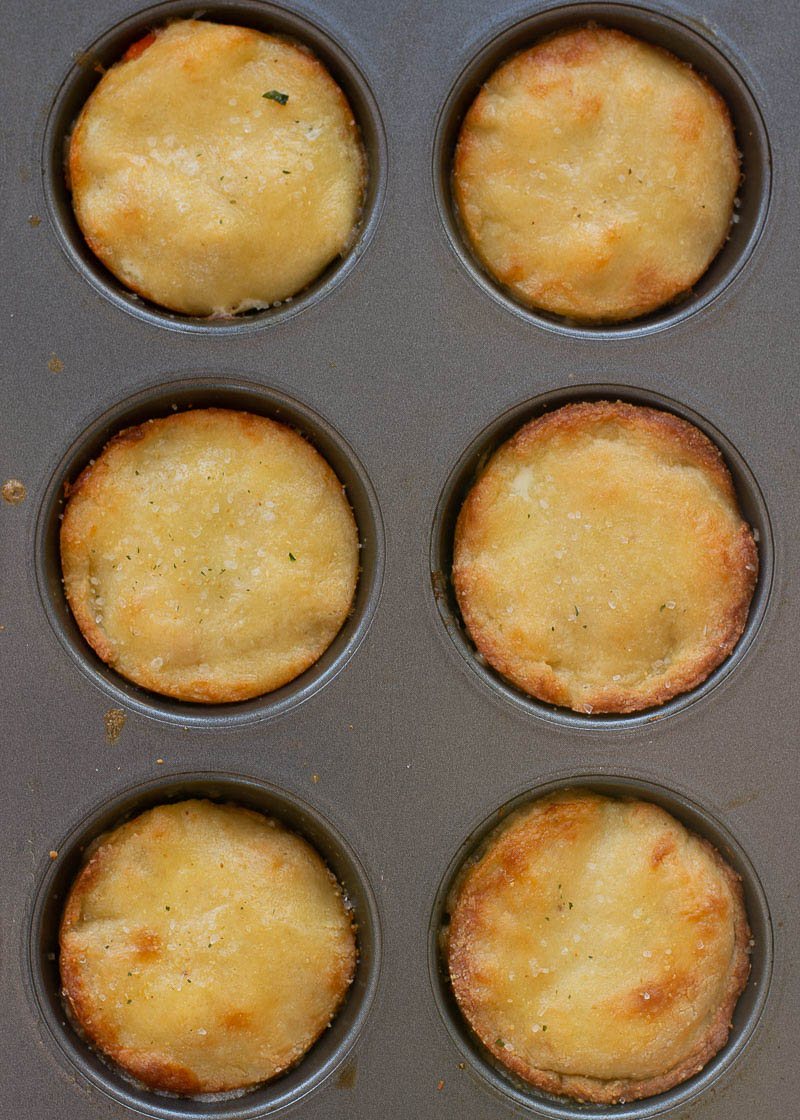 These delightful Mini Turkey Pot Pies are the perfect way to use leftover turkey! Each mini pie is loaded with turkey, vegetables and a creamy sauce for about 2 net carbs each! 