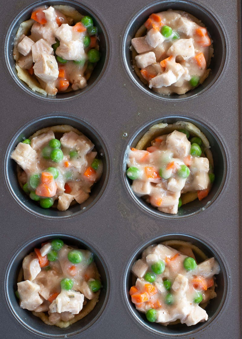 These delightful Mini Turkey Pot Pies are the perfect way to use leftover turkey! Each mini pie is loaded with turkey, vegetables and a creamy sauce for about 2 net carbs each! 