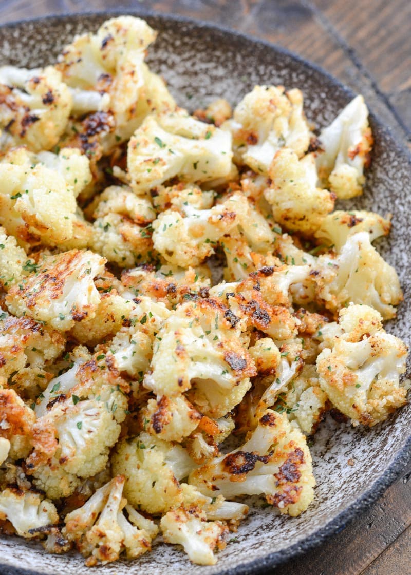 Parmesan Roasted Cauliflower is perfectly seasoned and roasted until crisp and full of flavor! Each serving has about 3 net carbs, making it an excellent keto cauliflower side dish! 