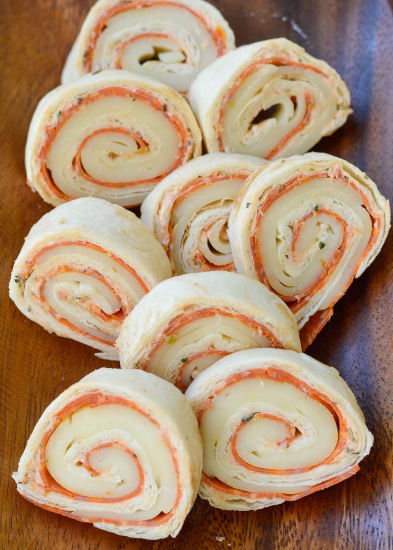 These Keto Pizza Pinwheels are packed with pepperoni, mozzarella, and a creamy, cheesy, marinara spread! This no-cook keto appetizers are great for lunches, parties, snacks, and more!