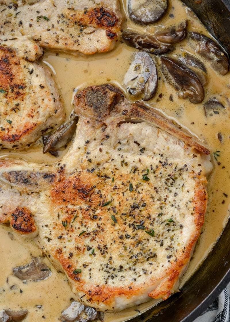 These Pork Chops in Mushroom Sauce taste incredibly decadent, but they take just 30 minutes to prepare! This is an easy keto dinner recipe that anyone will happily gobble up!  