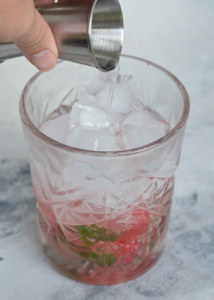 This Keto Raspberry Tequila Smash is the perfect keto drink! Mint, tequila and a sugar free simple syrup are combined in this delicious skinny cocktail, all for under 3 net carbs!