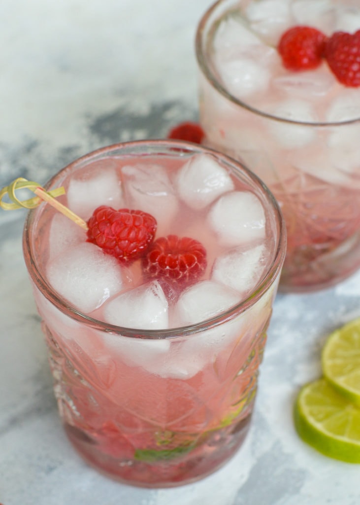 This Keto Raspberry Tequila Smash is the perfect keto drink! Mint, tequila and a sugar free simple syrup are combined in this delicious skinny cocktail, all for under 3 net carbs!