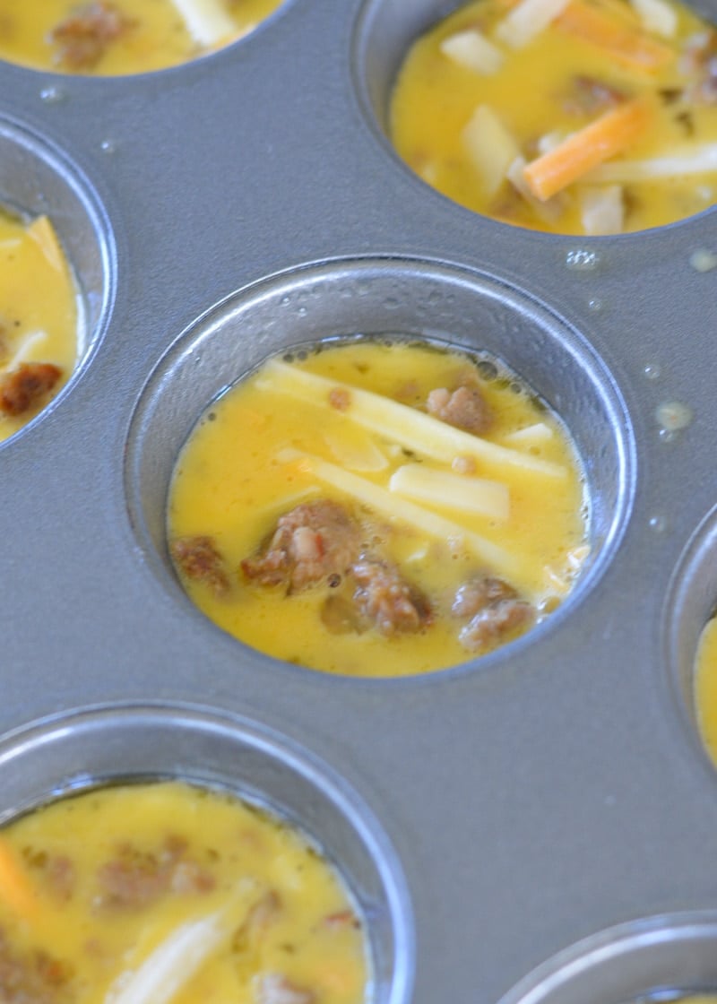 These five ingredient Sausage Cheese Keto Egg Muffins are less than 1 net carb each! This easy low carb breakfast recipe is great for keto meal prep! 