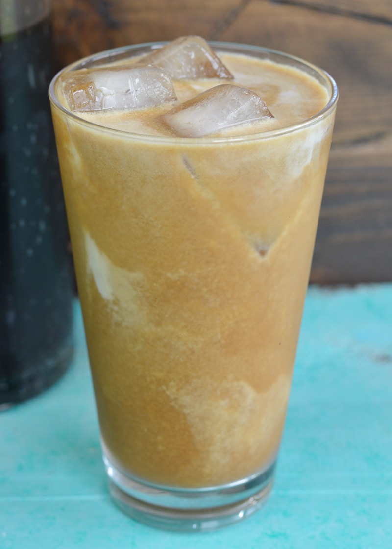 This Simple Iced Coffee is made using cold brew coffee. Learn just how easy it is to make a perfect large batch of iced coffee for a fraction of the coffee house price!