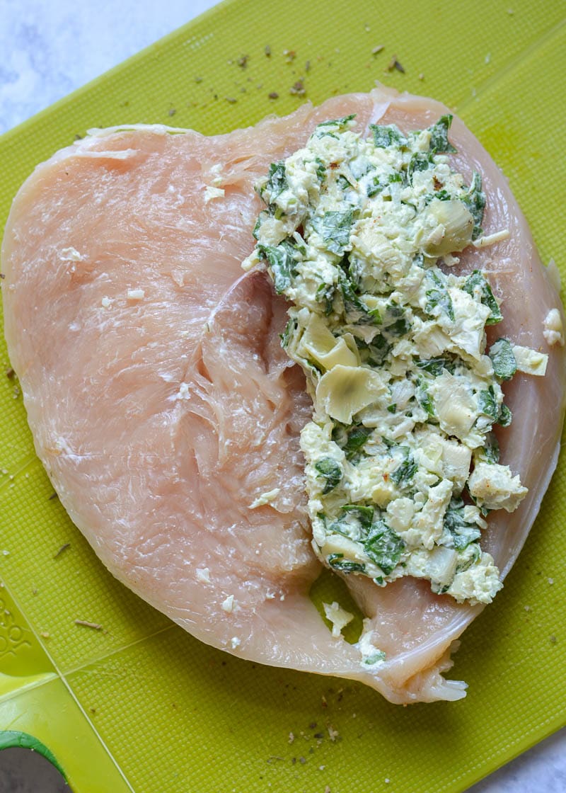 This low-carb Spinach Artichoke Stuffed Chicken is a keto 30-minute dinner dream! It's super juicy and mega flavorful--Even better, it all cooks in one pan and for easy cleanup!