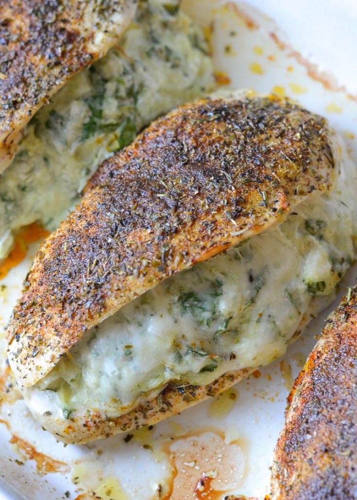 This low-carb Spinach Artichoke Stuffed Chicken is a keto 30-minute dinner dream! It's super juicy and mega flavorful--Even better, it all cooks in one pan and for easy cleanup!