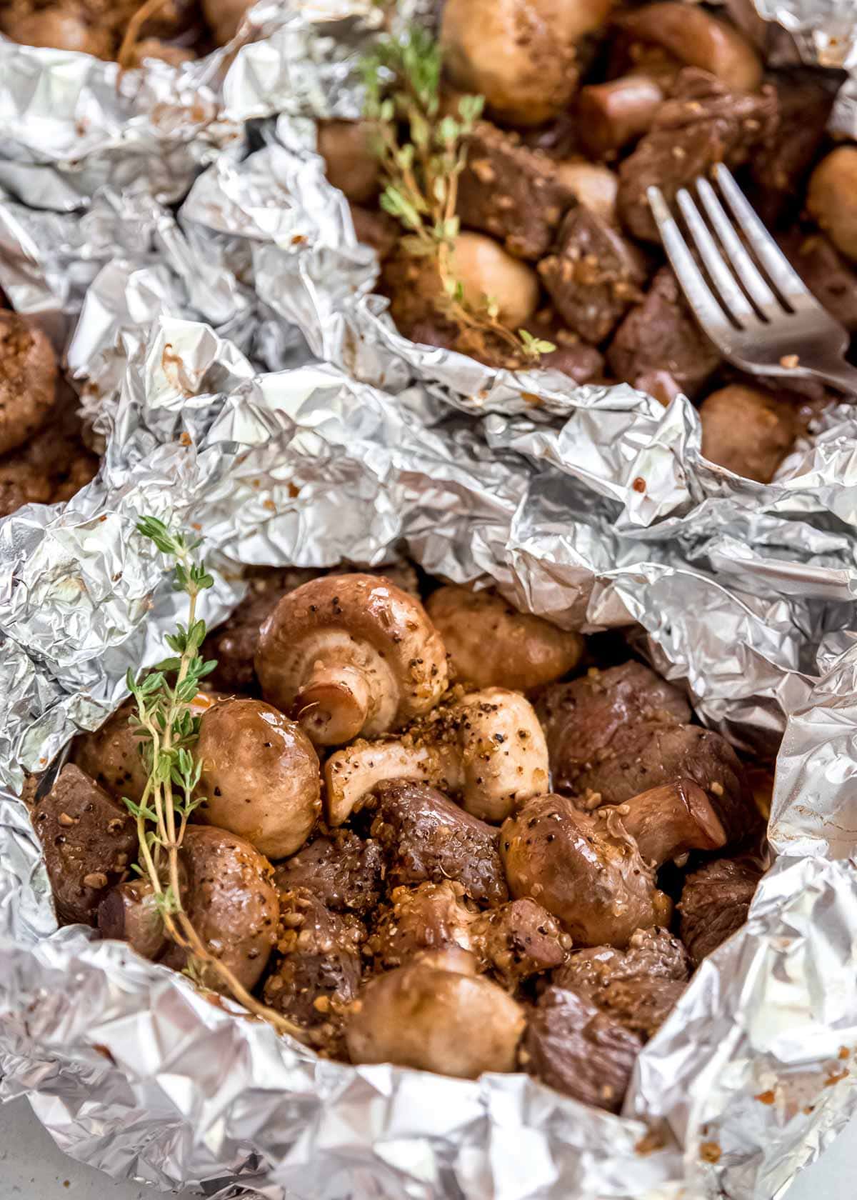 steak and mushroom in foil 