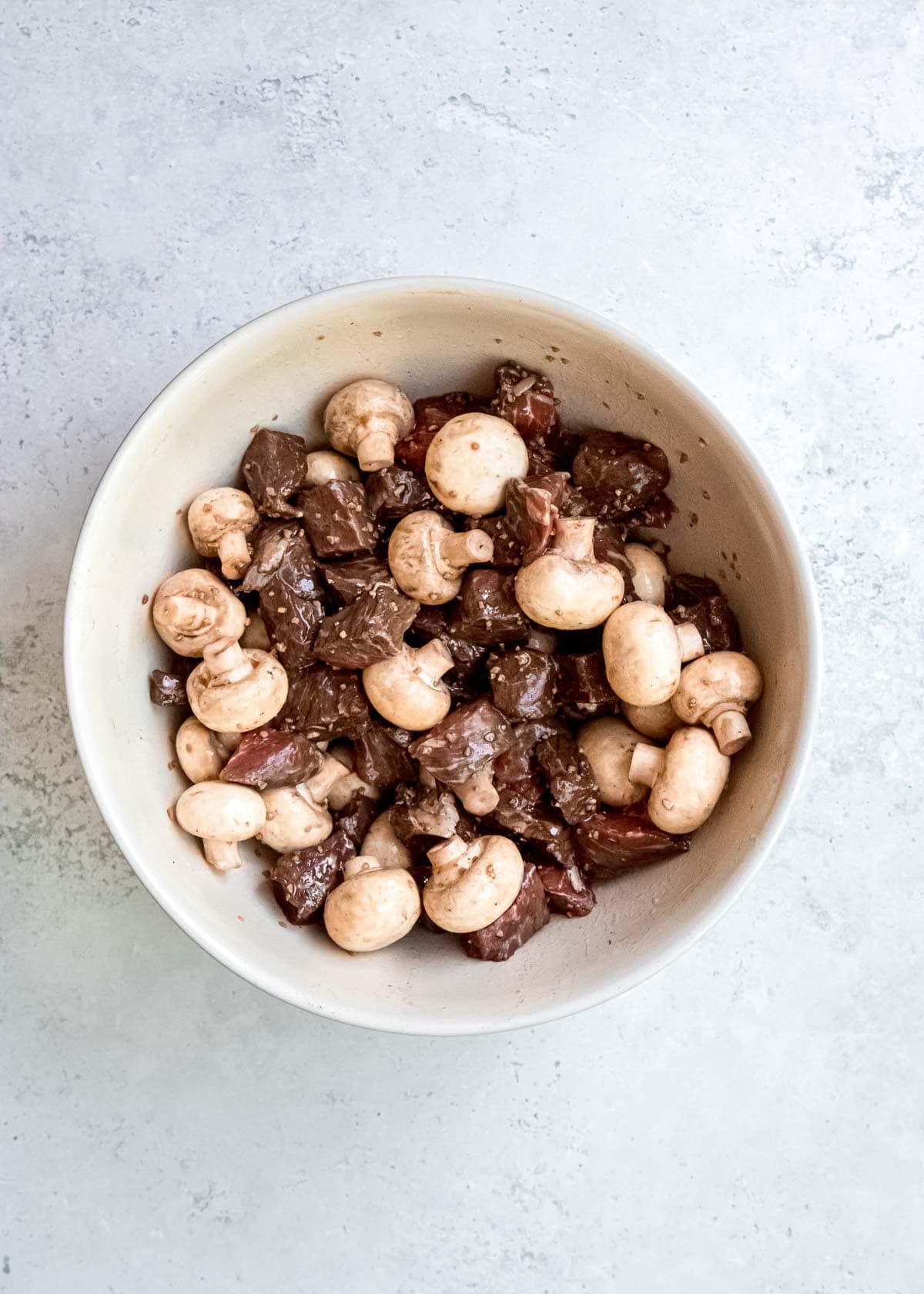 steak and mushrooms in bowl