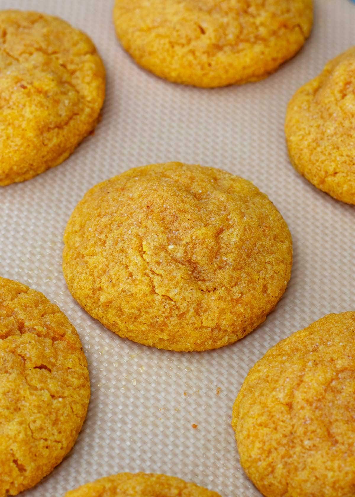 pumpkin cookies on baking sheet