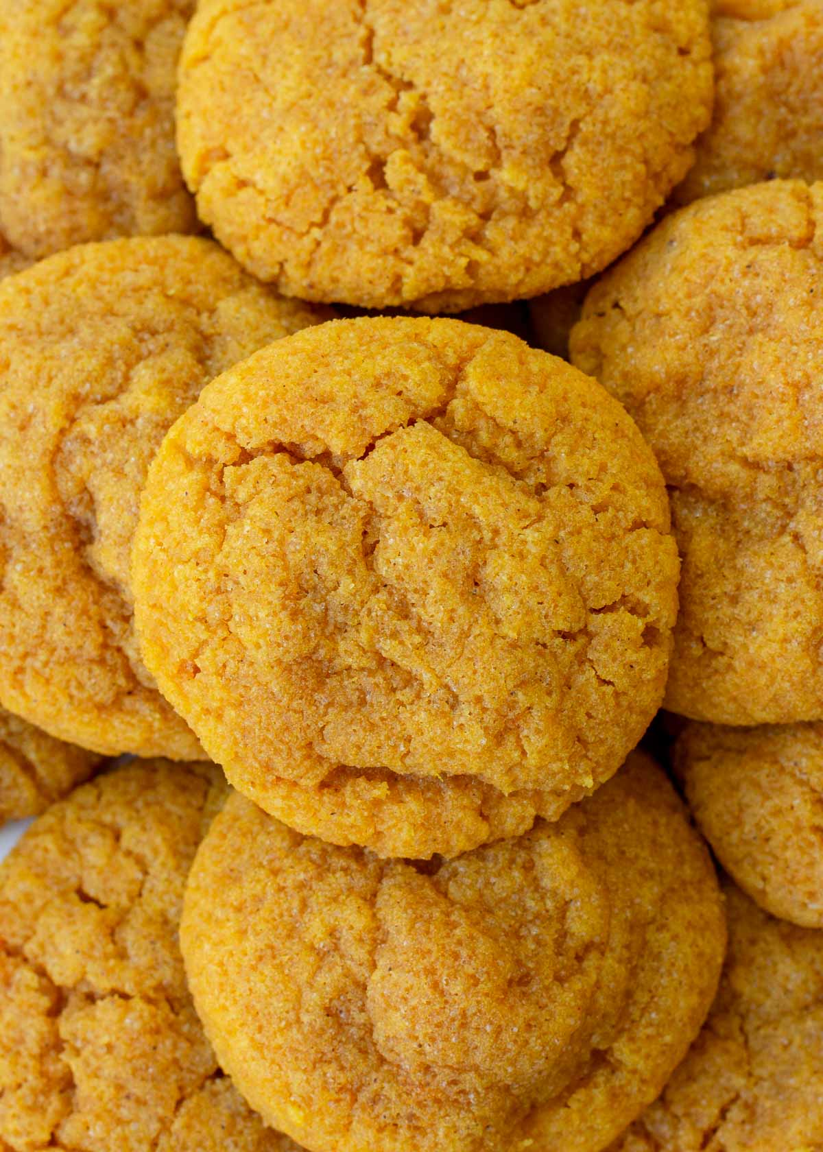 pumpkin cookies stacked on each other