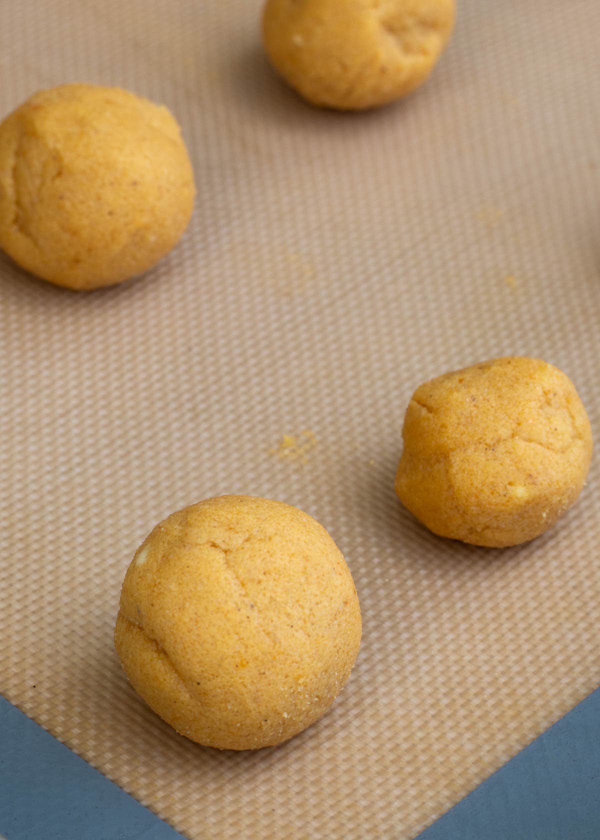 pumpkin cookie dough on baking sheet