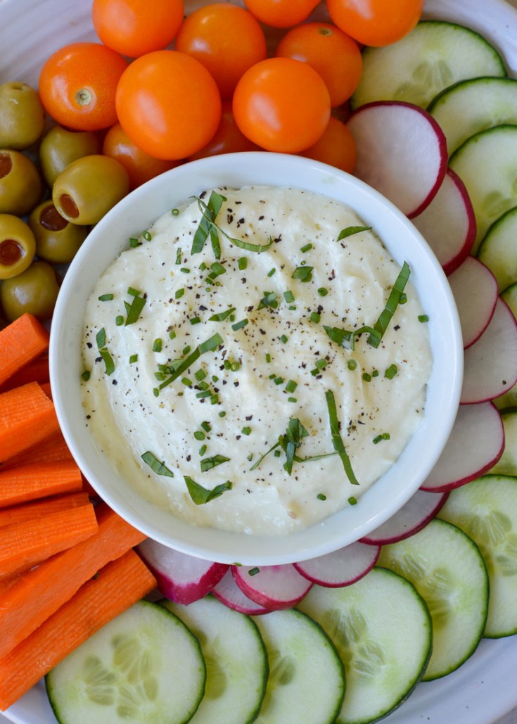 This creamy Whipped Feta Dip is the perfect low-carb appetizer. Bursting with lemon and garlic flavor, under 1 net carb per serving, and easy to make ahead of time!