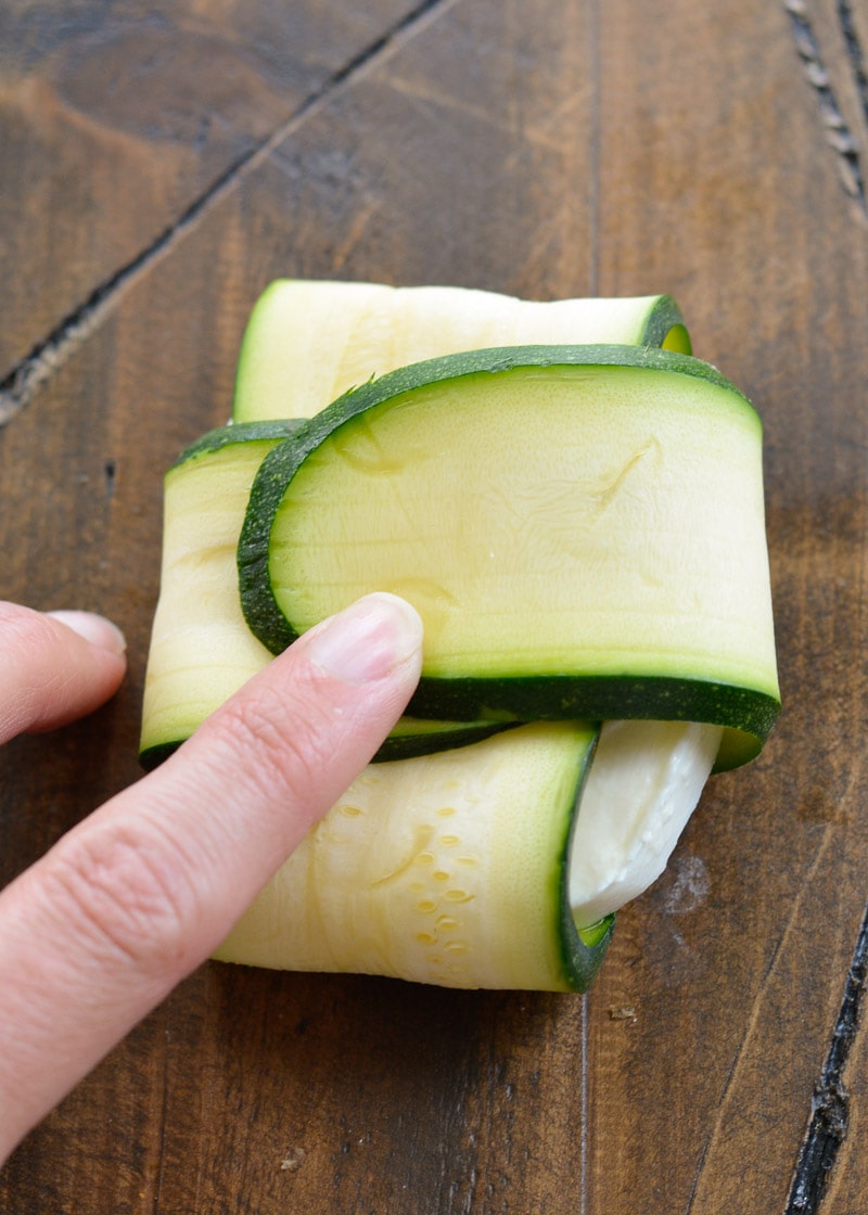 Grilled Zucchini Mozzarella Wraps are the ultimate keto summer side dish! Each wrap contains less than 1 net carb and is perfect dipped in low carb marinara! 